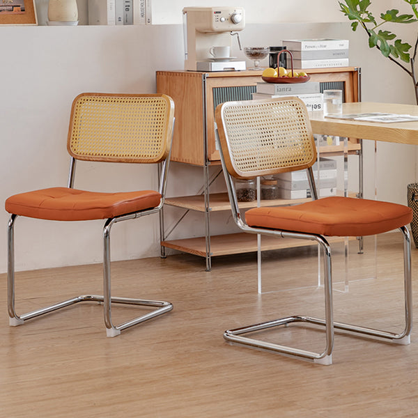 Silla lateral tapizada silla de brazo trasero de estilo moderno con base cromada