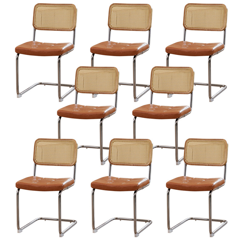 Silla lateral tapizada silla de brazo trasero de estilo moderno con base cromada