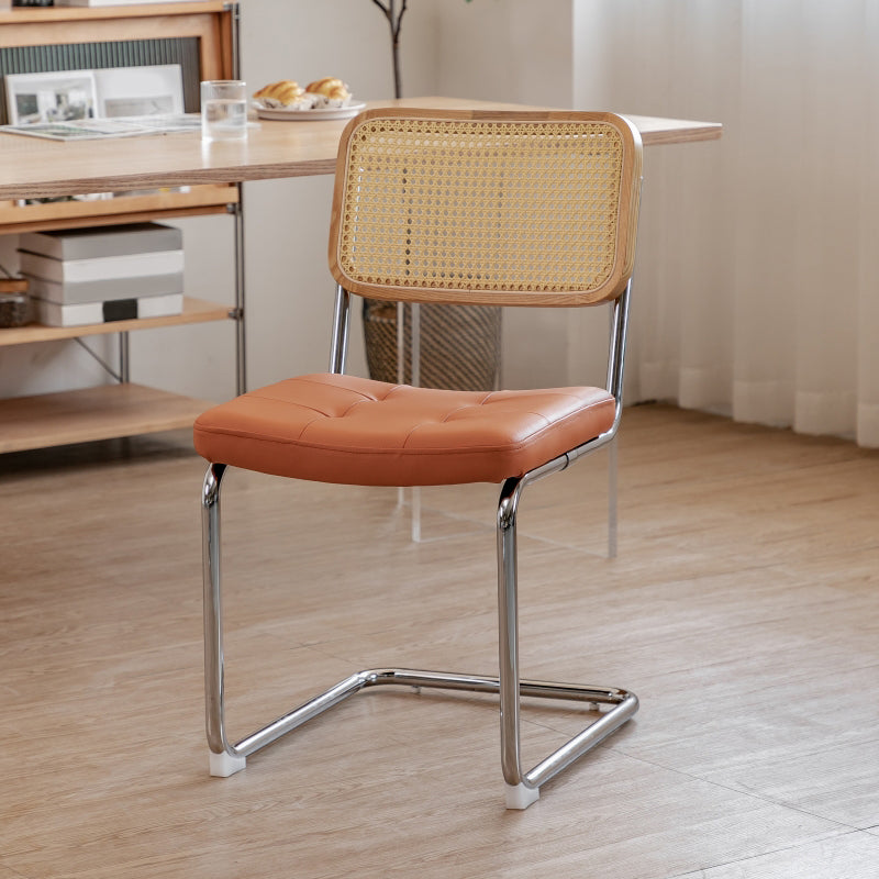 Silla lateral tapizada silla de brazo trasero de estilo moderno con base cromada