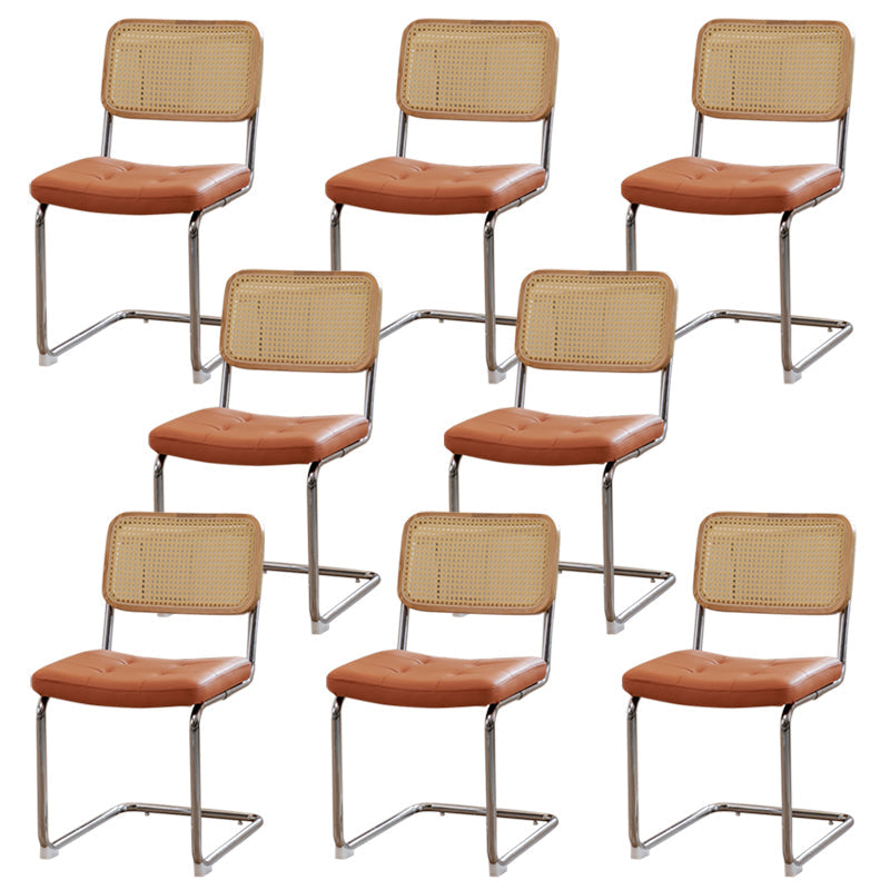 Silla lateral tapizada silla de brazo trasero de estilo moderno con base cromada