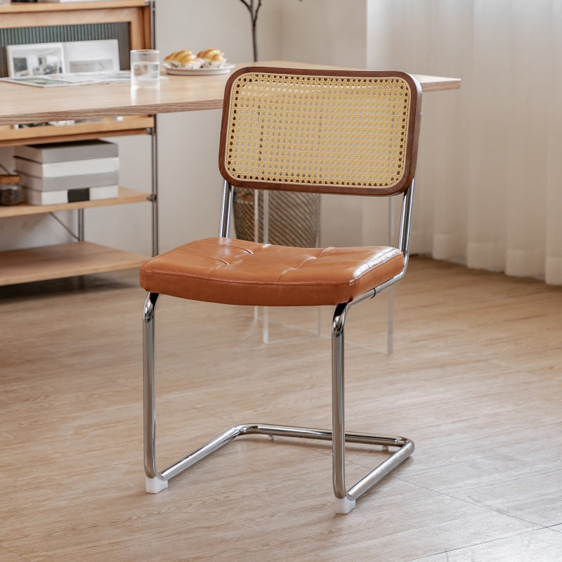 Silla lateral tapizada silla de brazo trasero de estilo moderno con base cromada