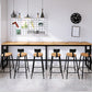 Sgabello da bar senza braccia da bar in stile industriale con gambe nere