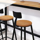 Sgabello da bar senza braccia da bar in stile industriale con gambe nere