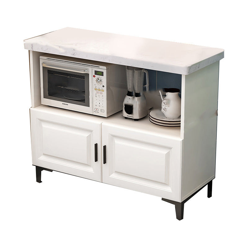 モダンなダイニングルームの島のテーブル貯蔵キャビネット付きの大理石の準備テーブル