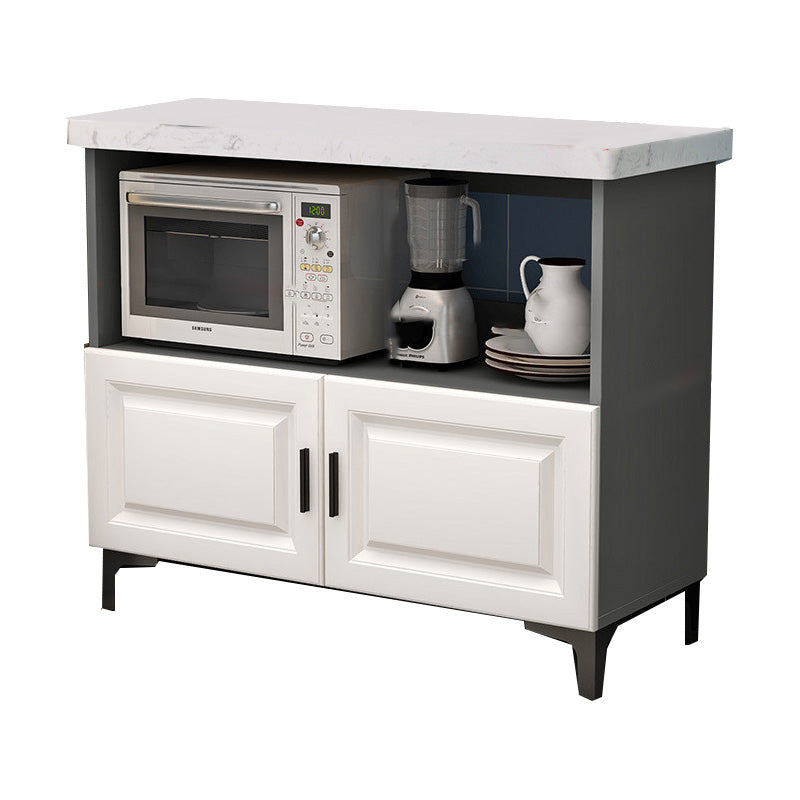 モダンなダイニングルームの島のテーブル貯蔵キャビネット付きの大理石の準備テーブル