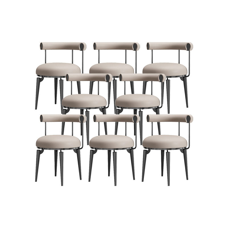 Silla de brazo tapizada estilo glamour de comedor abierto con patas de metal