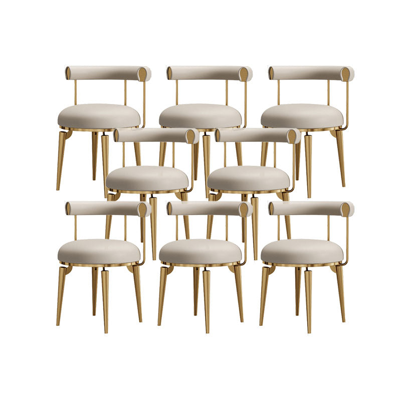 Silla de brazo tapizada estilo glamour de comedor abierto con patas de metal