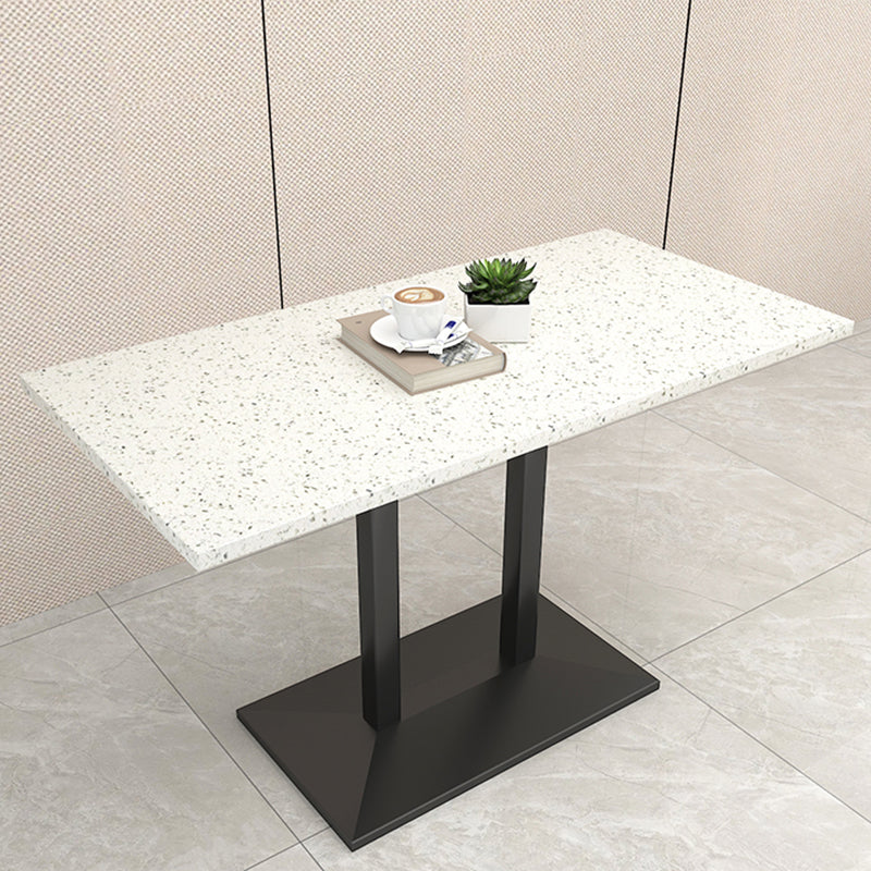 Mesa de comedor de piedra geométrica moderna con base metálica para comedor