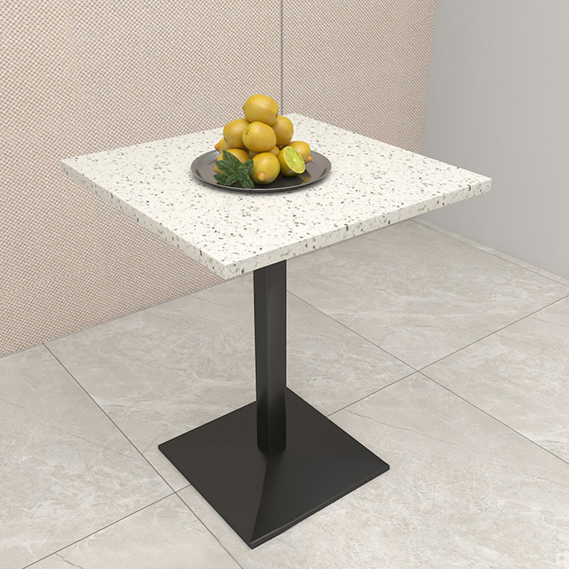 Mesa de comedor de piedra geométrica moderna con base metálica para comedor