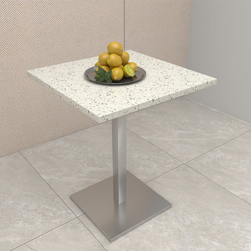 Mesa de comedor de piedra geométrica moderna con base metálica para comedor
