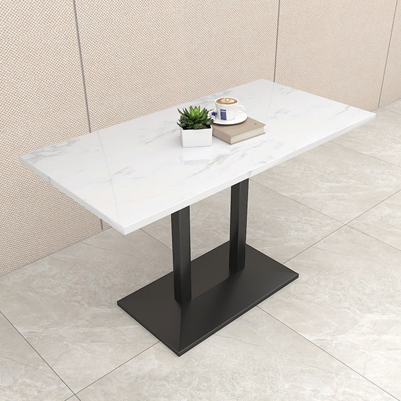 Mesa de comedor de piedra geométrica moderna con base metálica para comedor