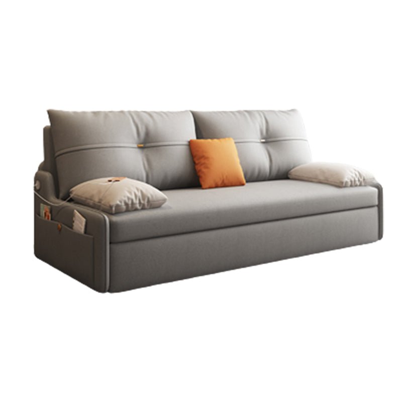 Canapé-lit gris gris futon avec dos touflé et rangement en faux cuir