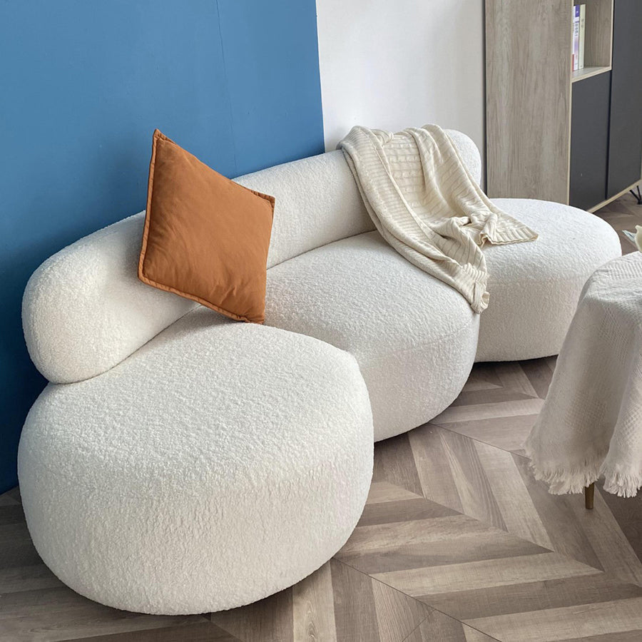 Canapé en laine de style contemporain dans un canapé rembourré en blanc incurvé