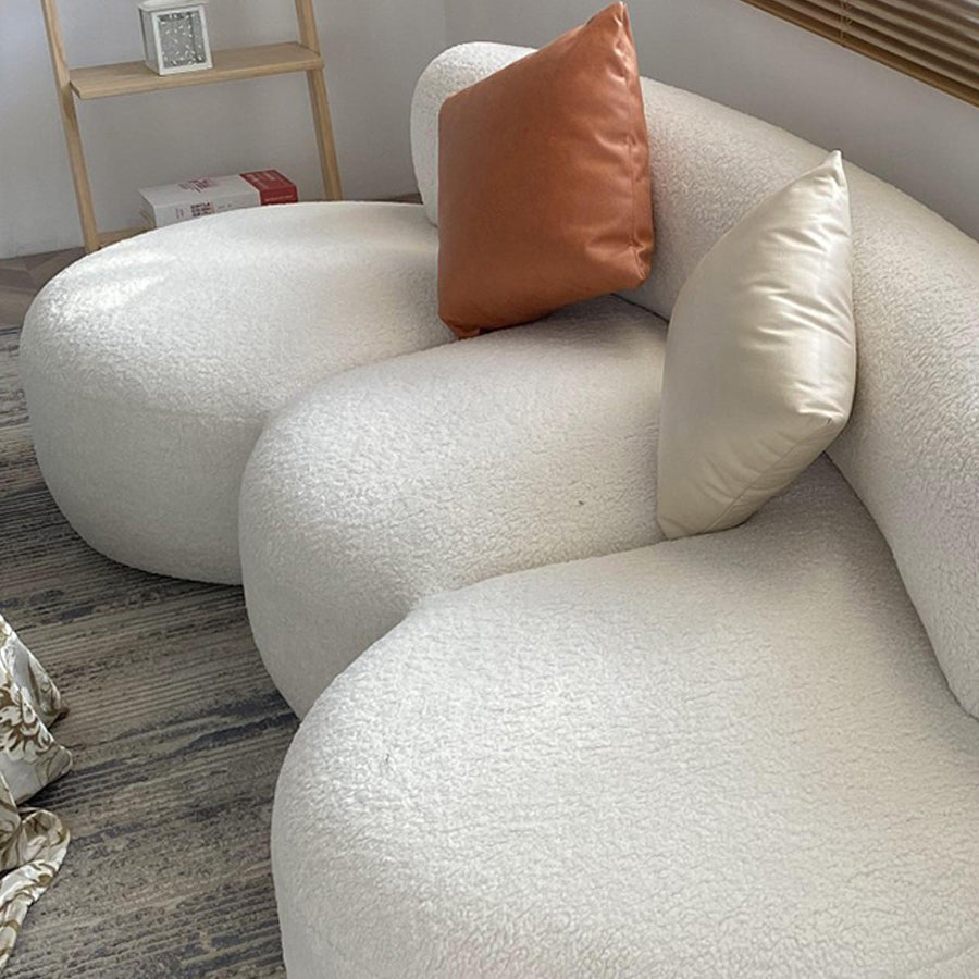 Canapé en laine de style contemporain dans un canapé rembourré en blanc incurvé