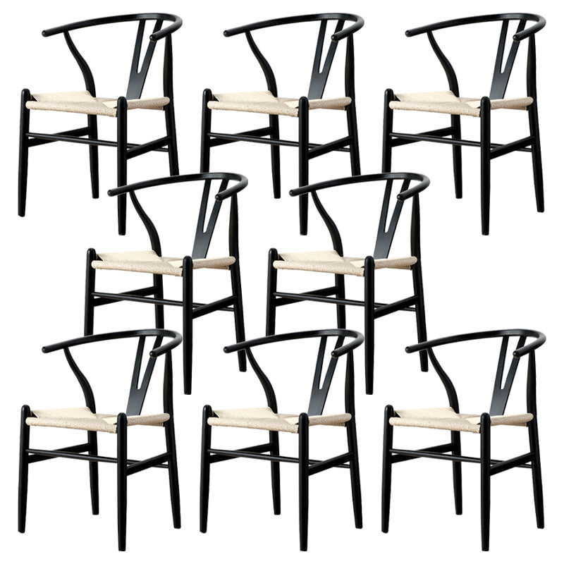 Silla de respaldo moderna de reposabrazos con patas de madera para el comedor