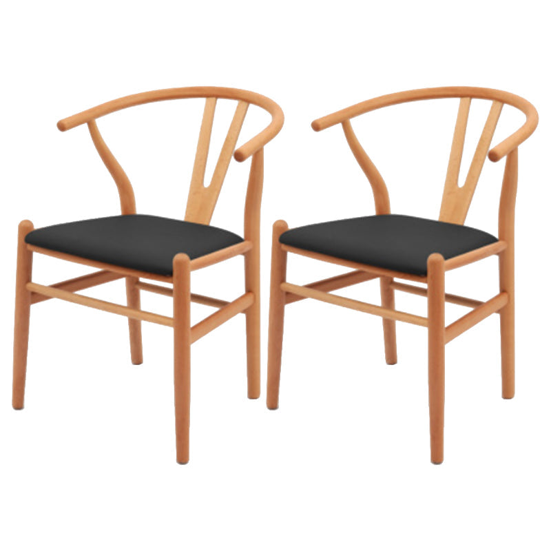 Silla de respaldo moderna de reposabrazos con patas de madera para el comedor