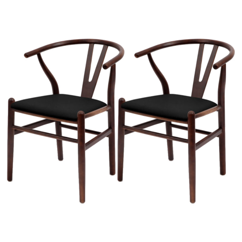 Silla de respaldo moderna de reposabrazos con patas de madera para el comedor