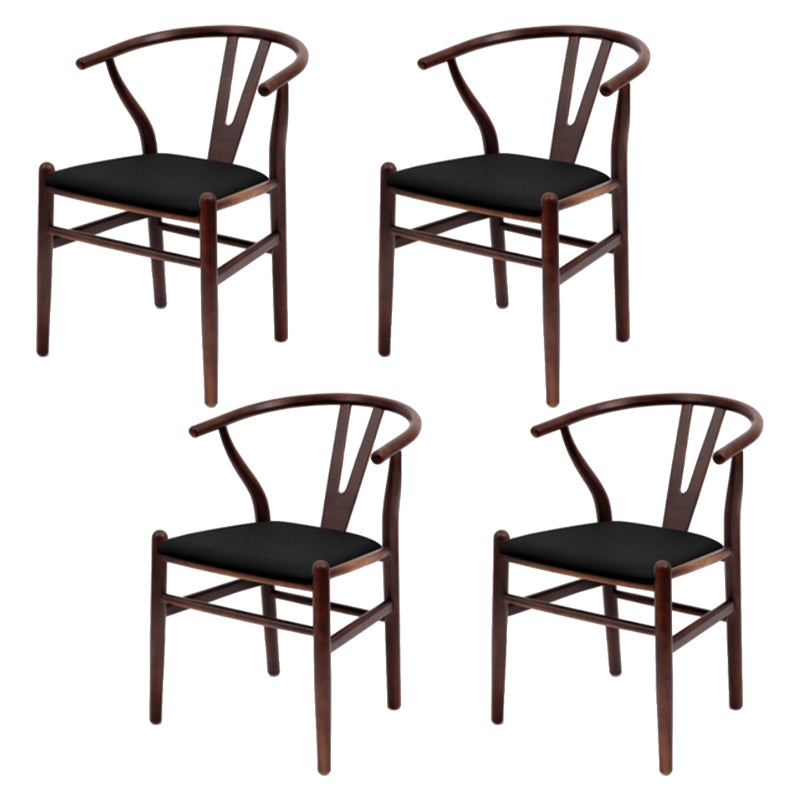 Silla de respaldo moderna de reposabrazos con patas de madera para el comedor