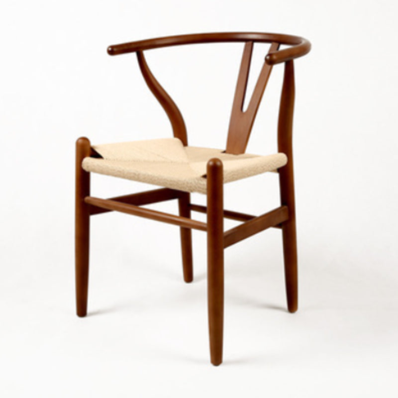Silla de respaldo moderna de reposabrazos con patas de madera para el comedor