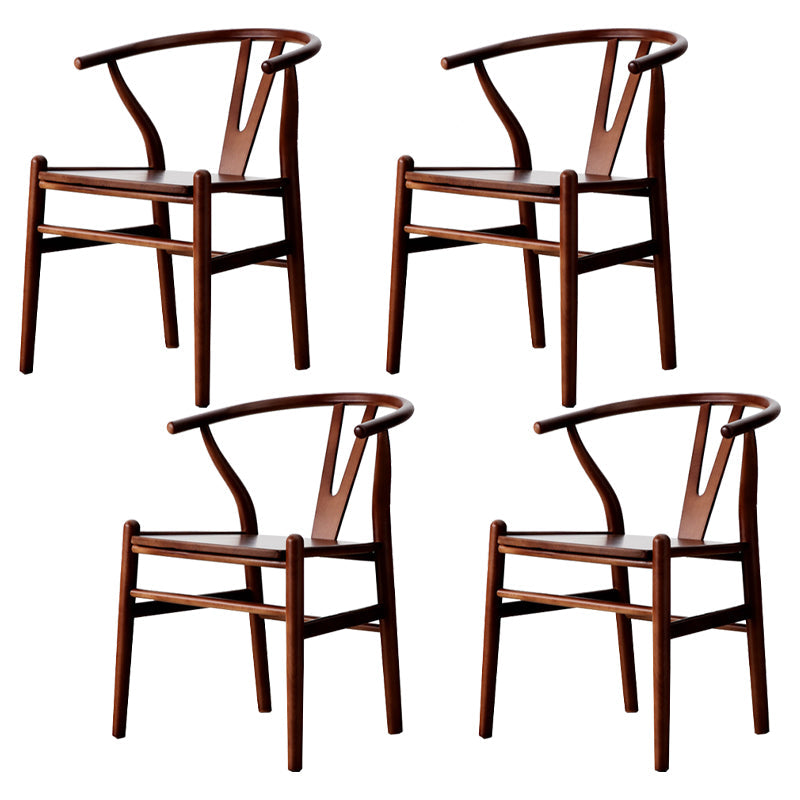 Silla de respaldo moderna de reposabrazos con patas de madera para el comedor