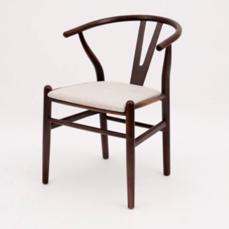 Silla de respaldo moderna de reposabrazos con patas de madera para el comedor
