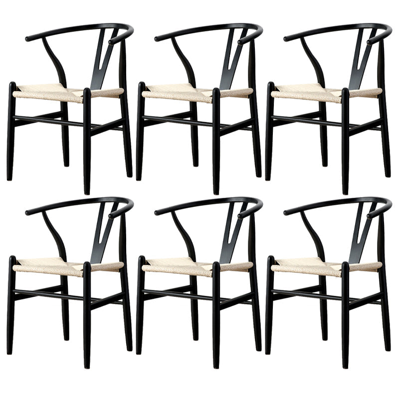 Silla de respaldo moderna de reposabrazos con patas de madera para el comedor