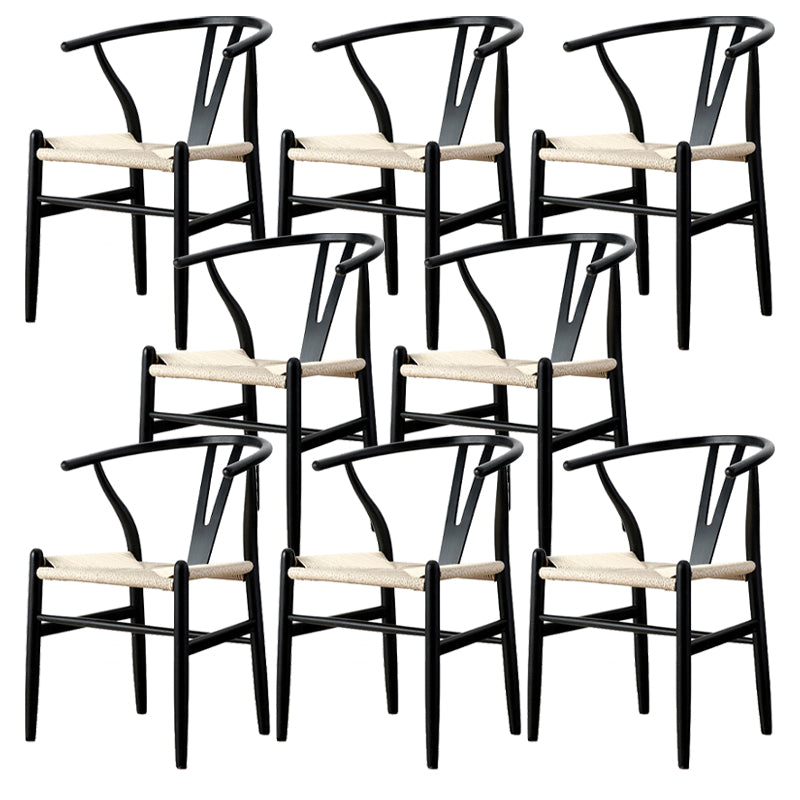 Silla de respaldo moderna de reposabrazos con patas de madera para el comedor