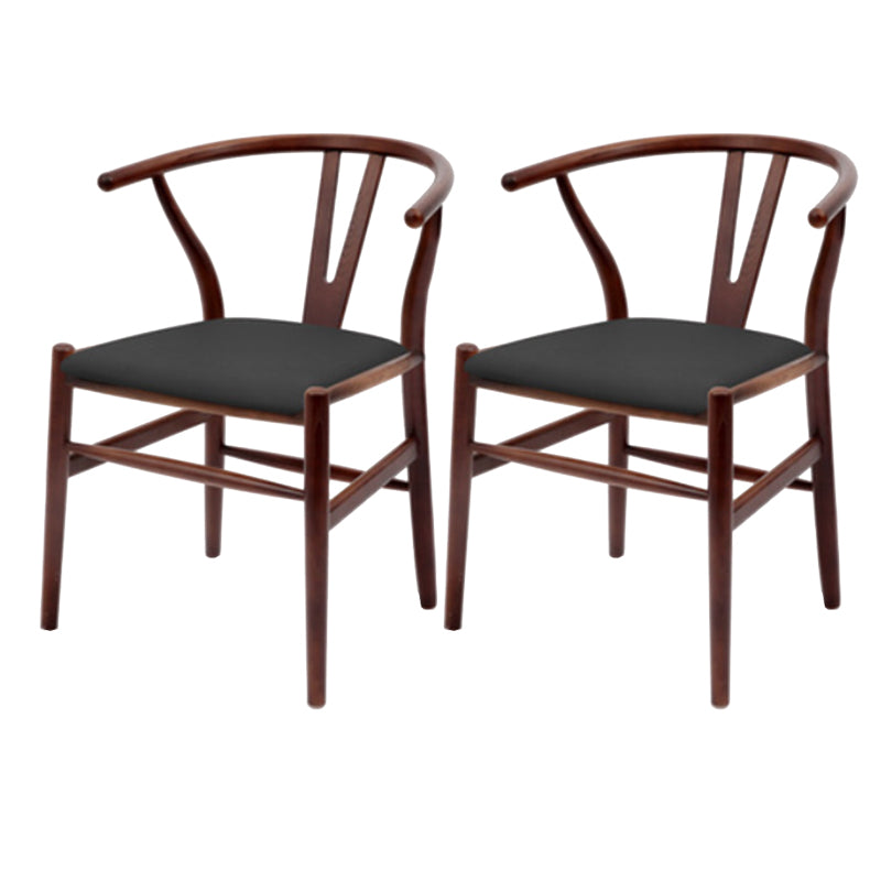 Silla de respaldo moderna de reposabrazos con patas de madera para el comedor