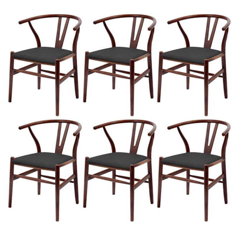 Silla de respaldo moderna de reposabrazos con patas de madera para el comedor