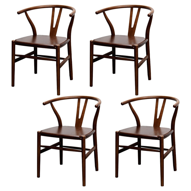 Silla de respaldo moderna de reposabrazos con patas de madera para el comedor