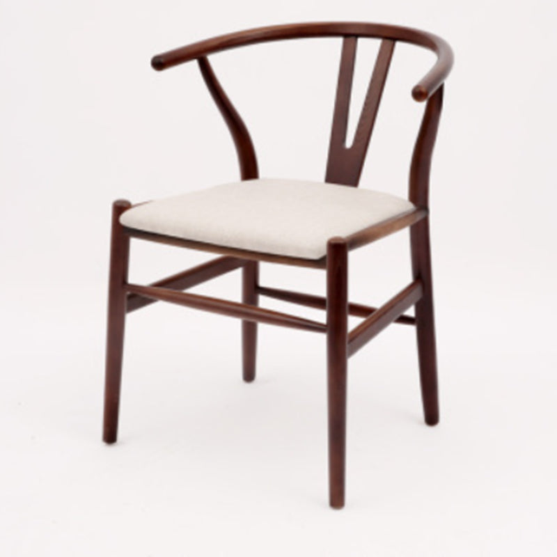 Silla de respaldo moderna de reposabrazos con patas de madera para el comedor
