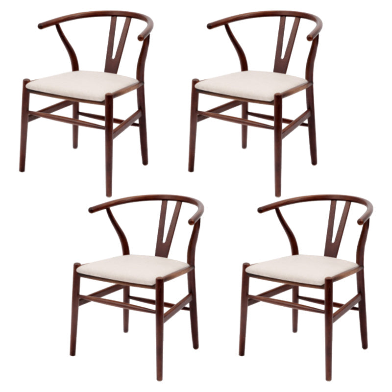 Silla de respaldo moderna de reposabrazos con patas de madera para el comedor