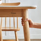 Moderne massief houten poten eettafel met rechthoekig stenen blad