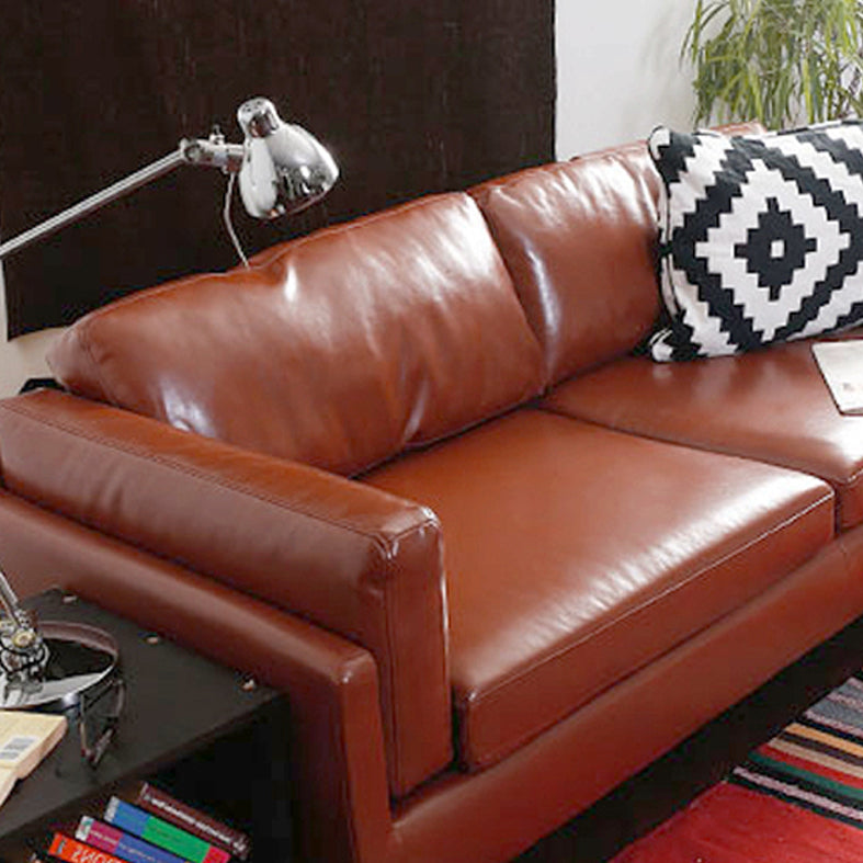 Canapé en cuir faux en cuir carré avec coussins pour le salon