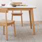 Mesa de comedor rectangular de piedra moderna con patas de madera para comedor