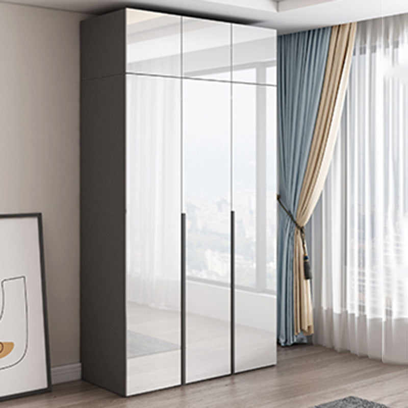 Dormitorio Gabinete de vestuario de madera Armario moderno con suaves puertas cerradas