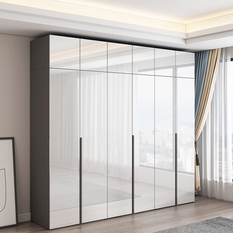 Dormitorio Gabinete de vestuario de madera Armario moderno con suaves puertas cerradas