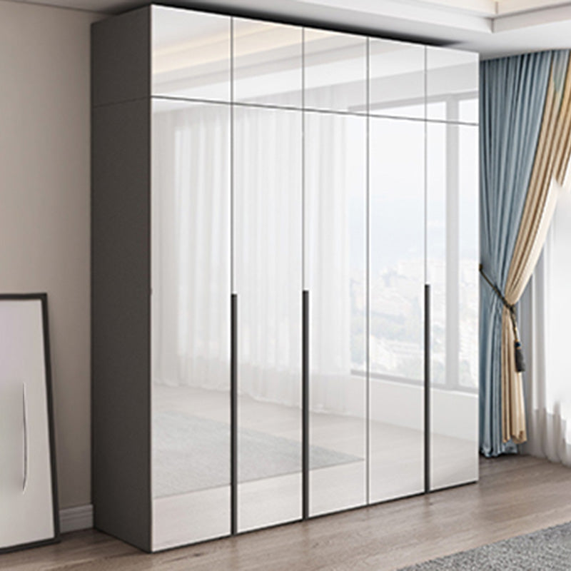 Dormitorio Gabinete de vestuario de madera Armario moderno con suaves puertas cerradas