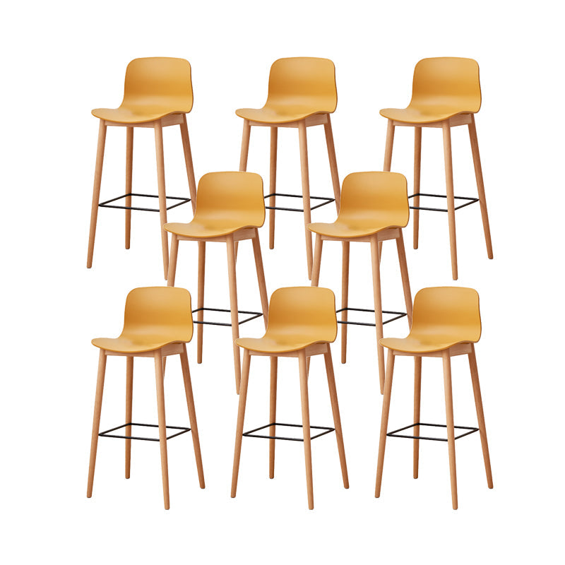 Contemporary Plastic Armless Bar Stools with Solid Wood Base