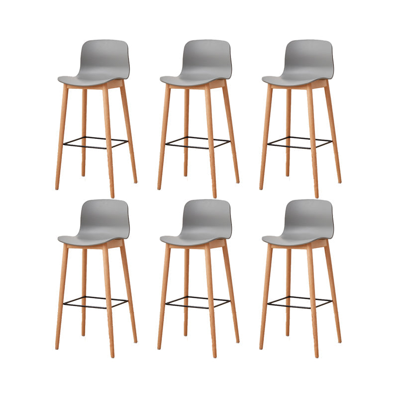 Contemporary Plastic Armless Bar Stools with Solid Wood Base
