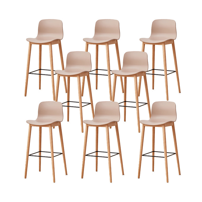 Contemporary Plastic Armless Bar Stools with Solid Wood Base