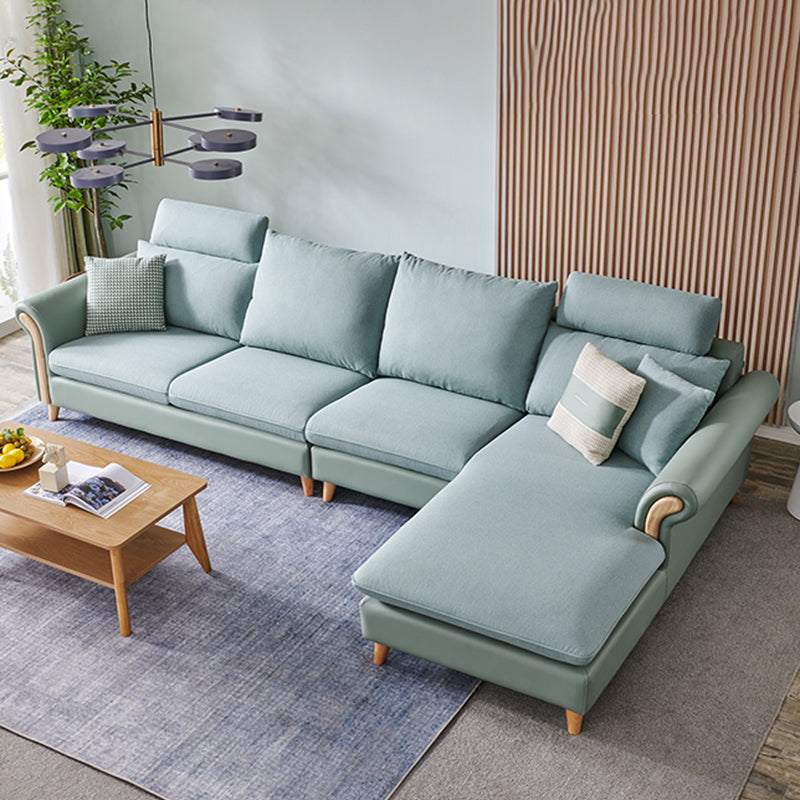 Sezionali di tessuto posteriore a cuscinetto svasato con un divano scandinavo con chaise