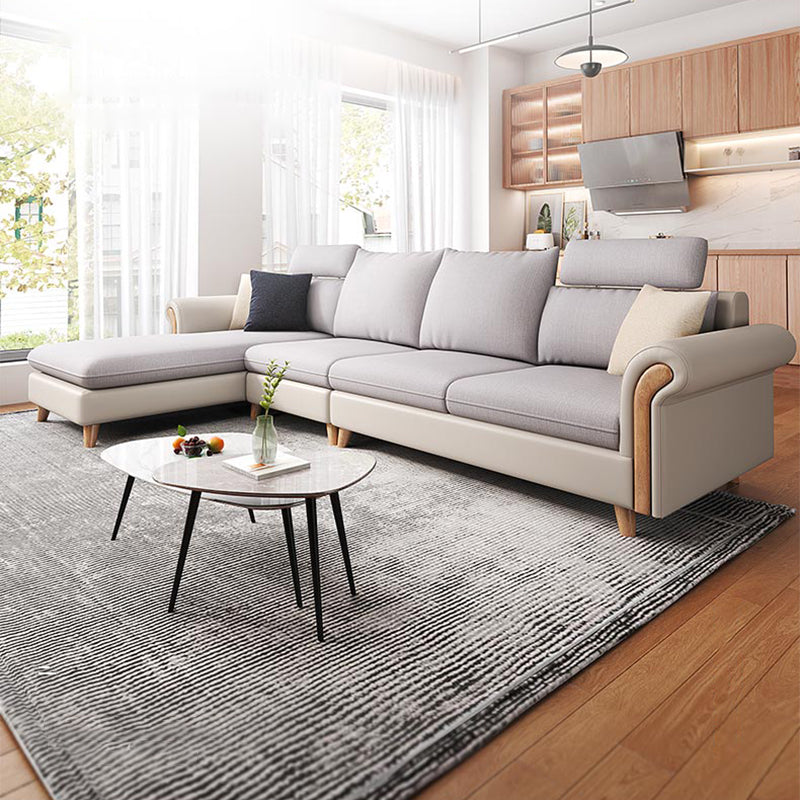 Sezionali di tessuto posteriore a cuscinetto svasato con un divano scandinavo con chaise