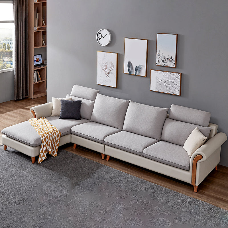 Sezionali di tessuto posteriore a cuscinetto svasato con un divano scandinavo con chaise