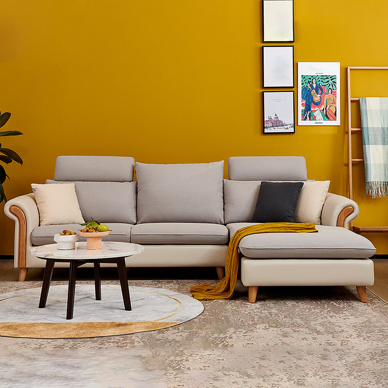 Sezionali di tessuto posteriore a cuscinetto svasato con un divano scandinavo con chaise