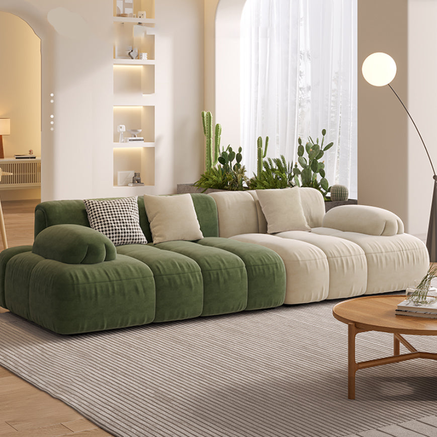 Sedute scandinaviane in finta pelle verde trapuntata braccio salotto