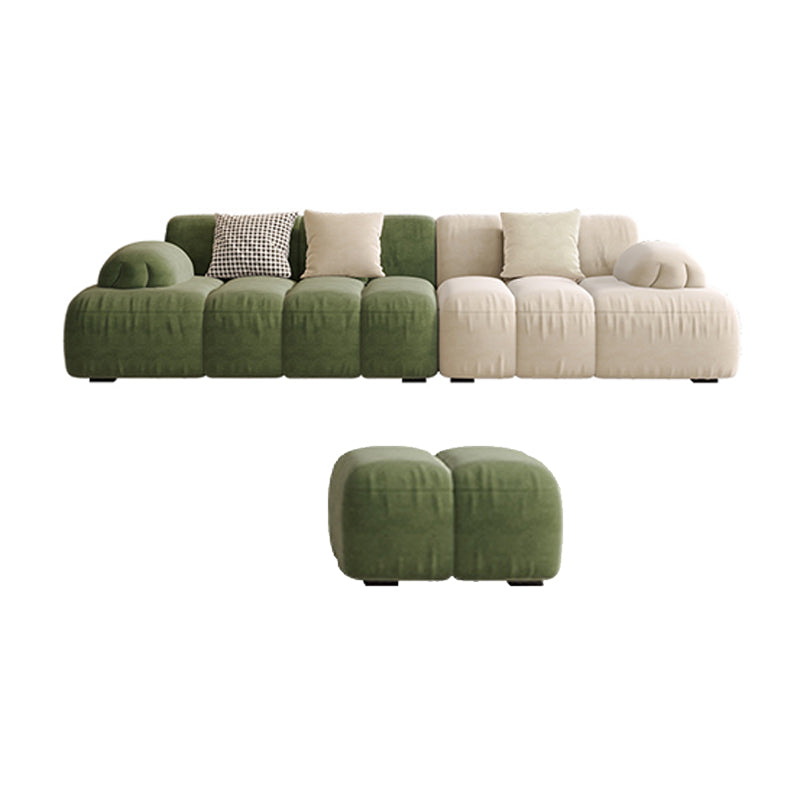 Sedute scandinaviane in finta pelle verde trapuntata braccio salotto