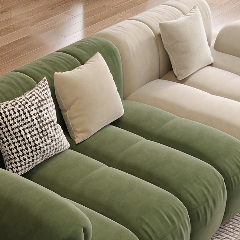 Sedute scandinaviane in finta pelle verde trapuntata braccio salotto