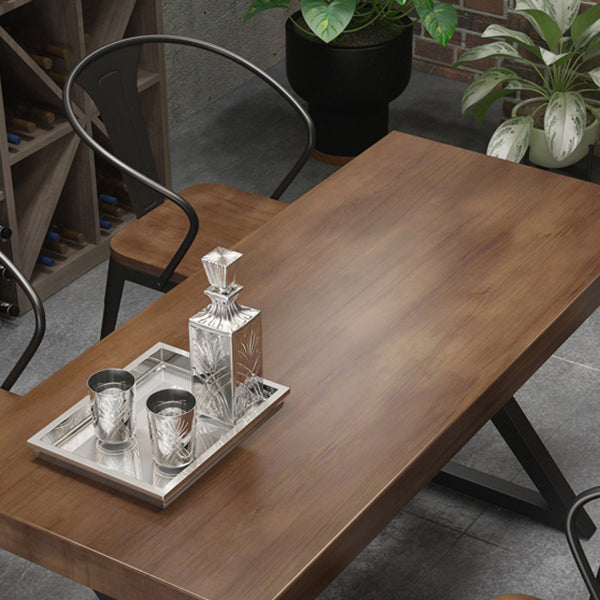 Mesa de comedor rectangular de madera maciza de estilo industrial con patas de hierro de pedestal doble