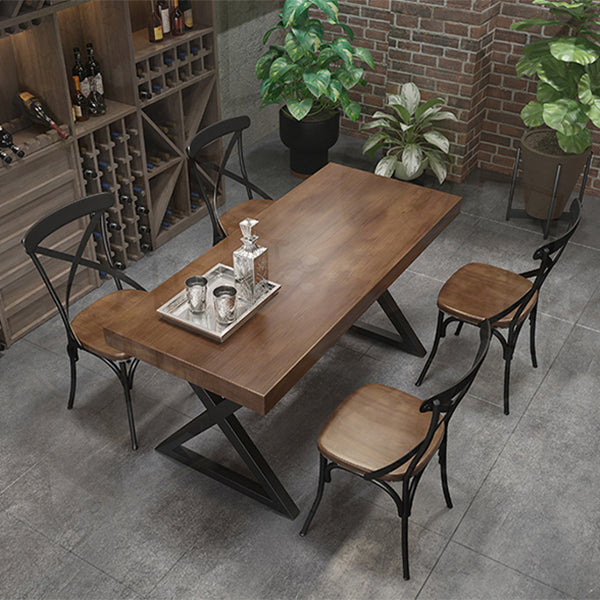 Mesa de comedor rectangular de madera maciza de estilo industrial con patas de hierro de pedestal doble